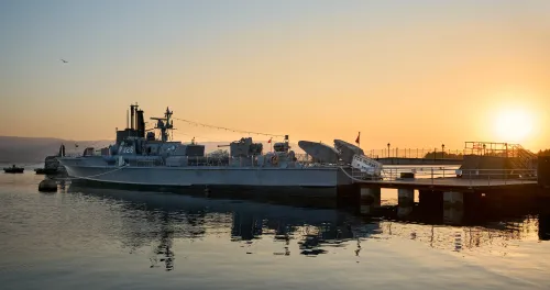The warship and the submarine behind it operate as museums in the port of Izmit.