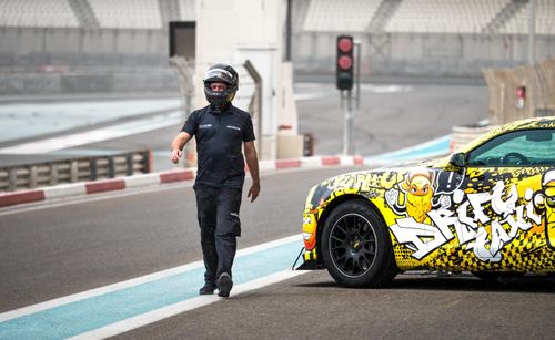 The Instructor with his Chevrolet Drift taxi